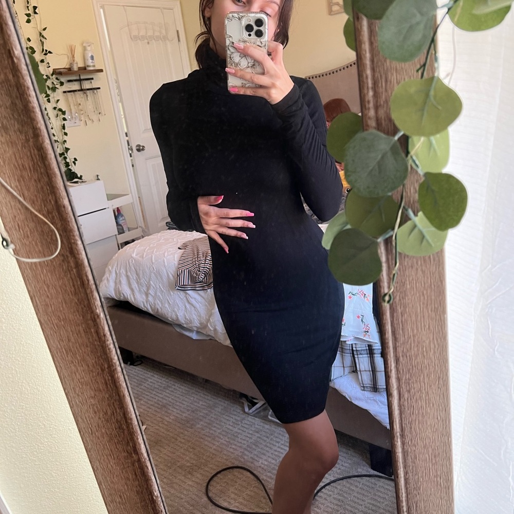Black tight turtle neck dress